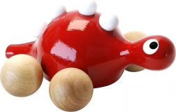 Drevený dinosaurus na kolieskach červený