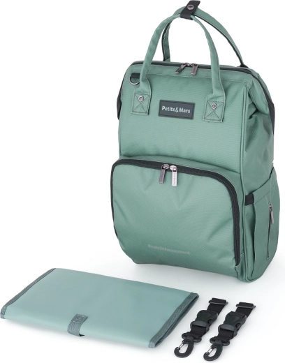 Voľné ruky vďaka uchyteniu na kočík a popruhu na kufor