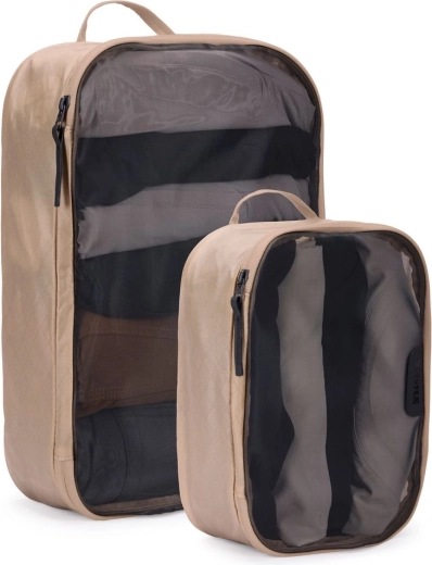 Sada Thule packing cubes (1× stredný + 1× malý) v jemnej béžovej