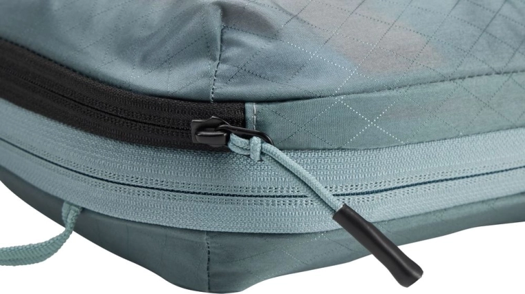 Kompresný zips pre maximum priestoru