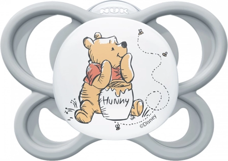 Cumlík NUK Perfect Match Air DISNEY Medvedík Pú, silikónový, 0–6 mesiacov, sivý