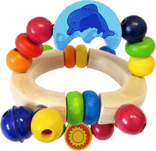 Drevená hrkálka s delfínom