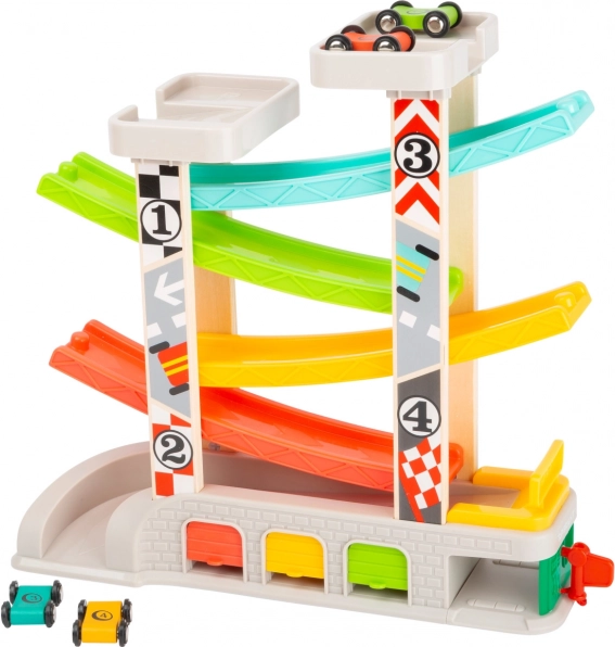 Závodná dráha s parkoviskom a garážami