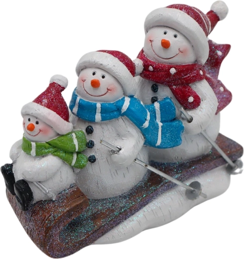 Dekorácia rodinka snehuliakov na saniach