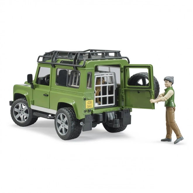 Lesníctvo - Land Rover Defender s myslivcom a psom