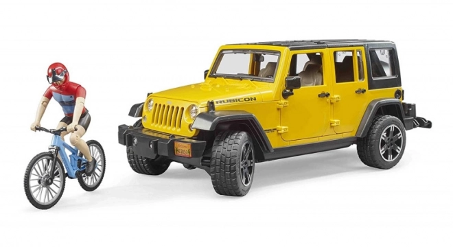 Jeep Wrangler Rubicon Unlimited s horským bicyklom a cyklistom