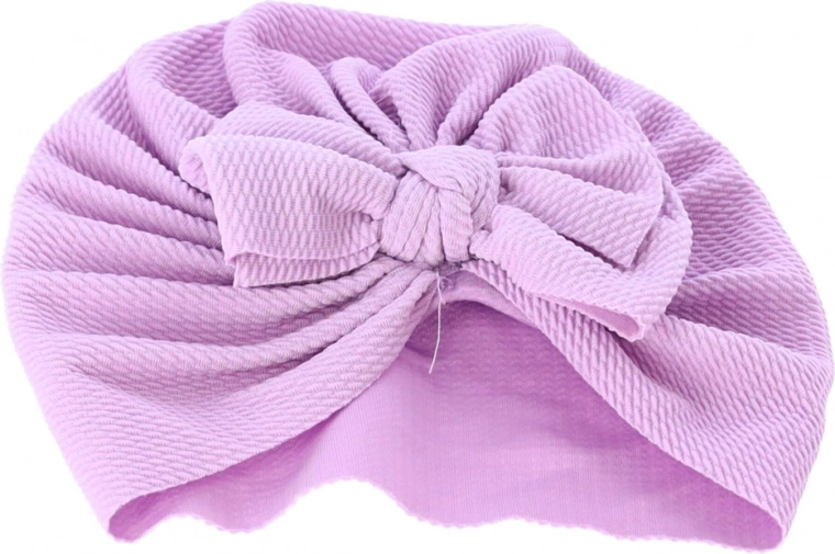 Roztomilá mašľa a turbanový strih