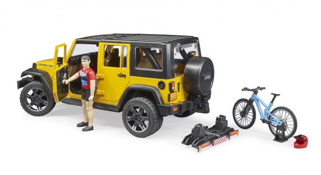 Jeep Wrangler Rubicon Unlimited s horským bicyklom a cyklistom