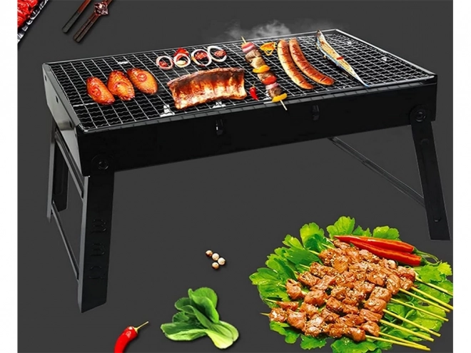 Prenosný skladací gril na drevené uhlie na kempovanie a BBQ