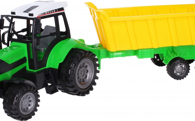 Veľký traktor s vlečkou