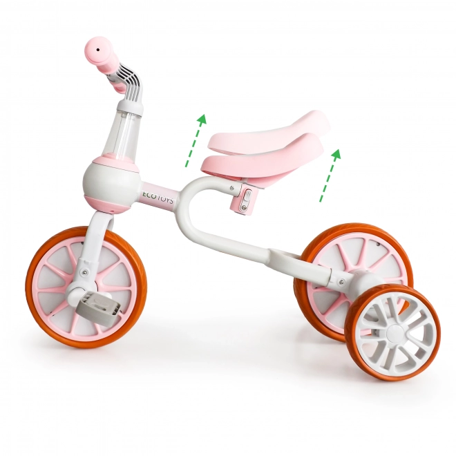 Odrážadlo 4v1 s pedálmi a bočnými kolieskami ružové Ecotoys